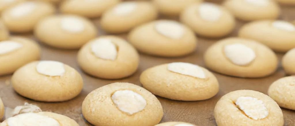 Display of assorted Amaretti cookies in various elegant packaging