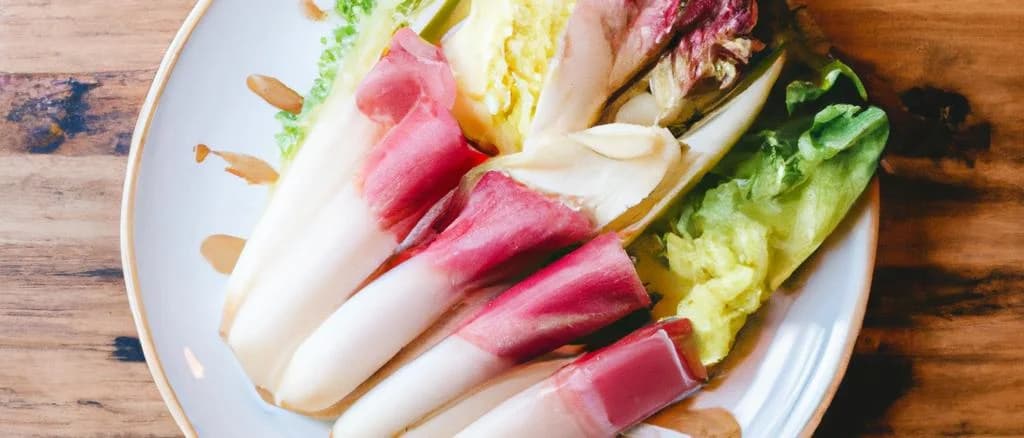 packaged endives with ham in various stylish containers on an elegant wooden table background