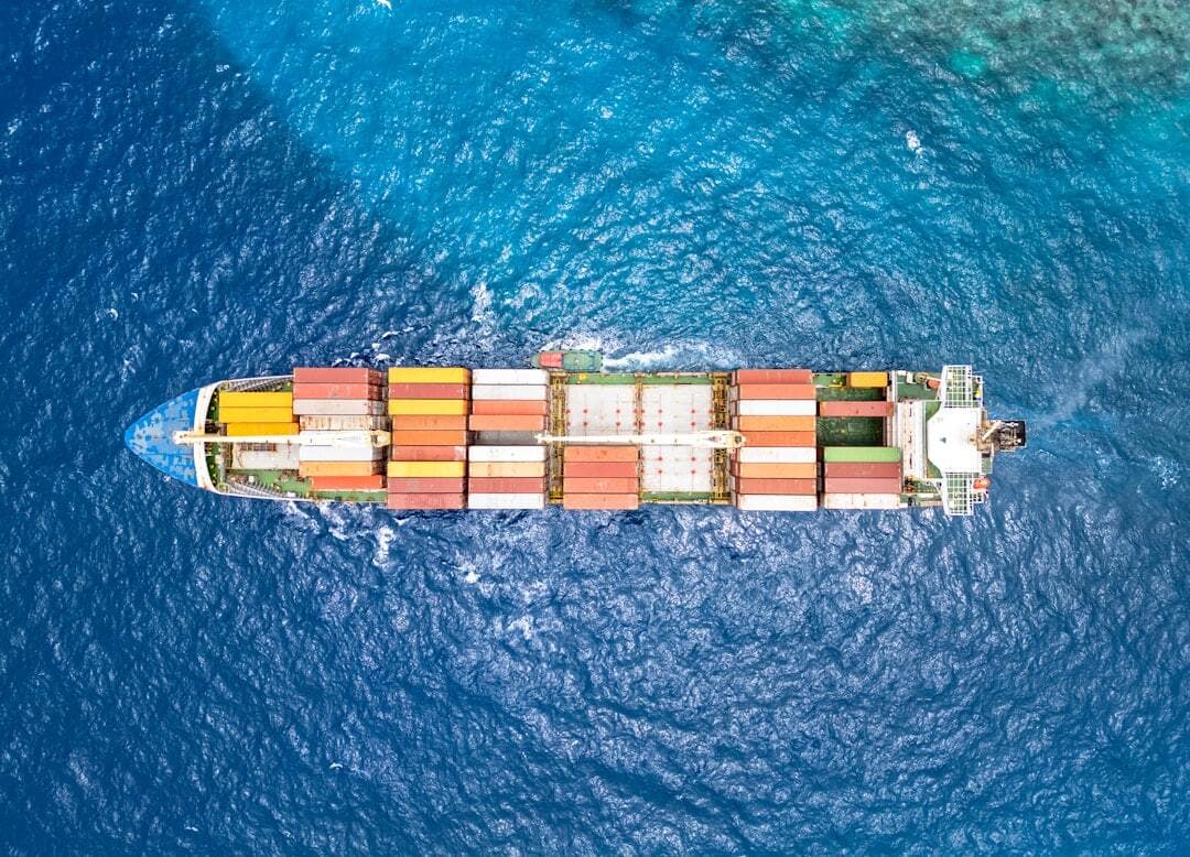 An aerial view of a cargo ship in the ocean