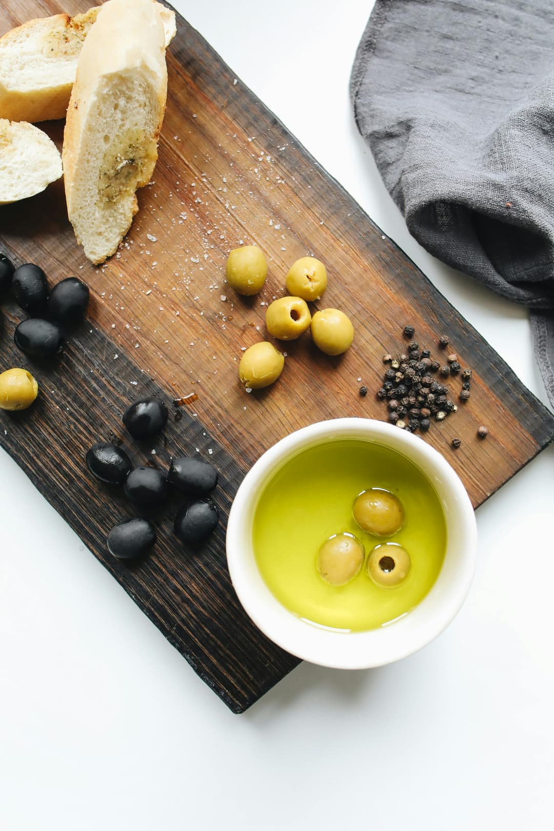 Olive oil with olives in it