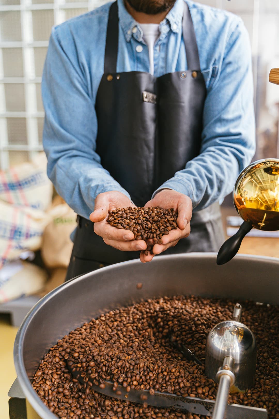 Man holding coffee beans